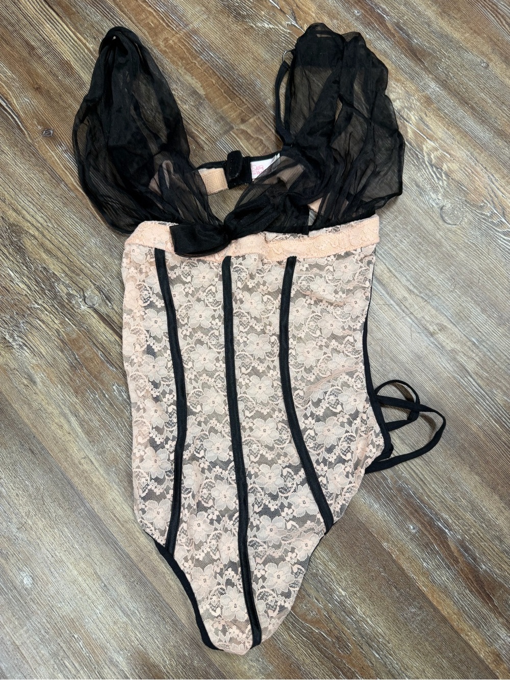 Shirley of Hollywood lingerie with beige floral pattern and black trim